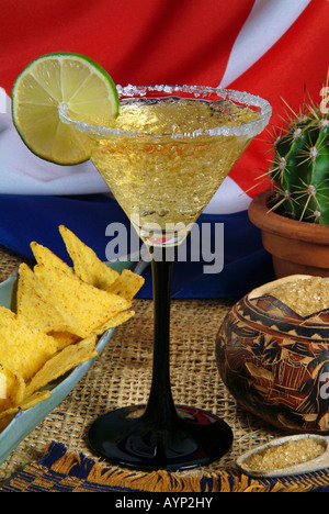 Frozen Lime Daiquiri cocktail with nachos, cuban flag and brown sugar Stock Photo