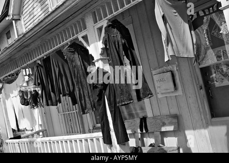 Laundry drying in the sun in front of an old house in the downtown eastside heritage neighbourhood of Strathcona. Stock Photo