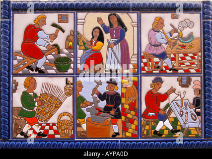 Ceramic tile mosaic showing different aspects of life and traditional crafts in Malaga, Andalusia, Spain. Stock Photo