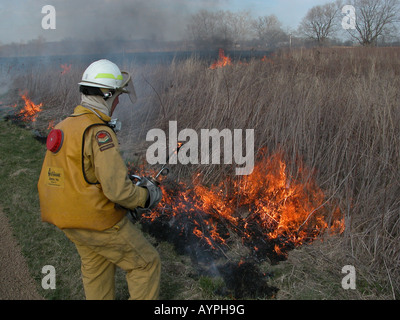 firefighter controlled prairie burn ohio Stock Photo