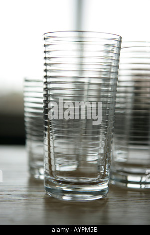 Some empty glasses kept on a table Stock Photo