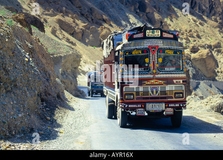 Colourfully painted truck driving along the main highway between Kashmir and Ladakh, India Stock Photo