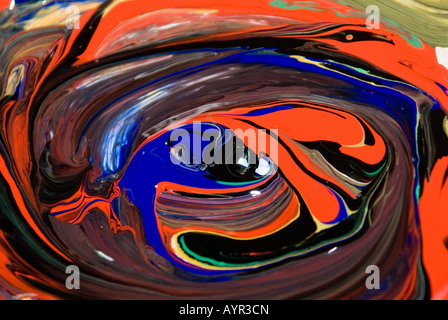 stunning colours in a swirl of mixed paint Stock Photo