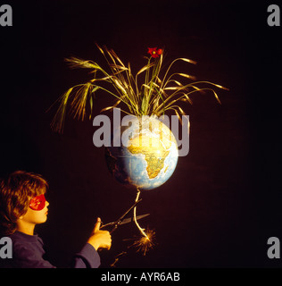 globe burning like a bomb with a match cord. Photo by Willy Matheisl Stock Photo