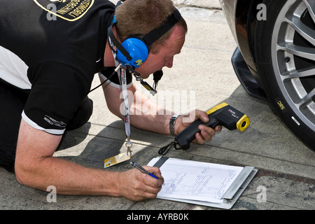 Mechanic collecting technical data, 24-hour race at the Nuerburgring racetrack in Nuerburg, Adenau, Rhineland-Palatinate, Germa Stock Photo