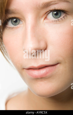 Close-up portrait of young woman's face Stock Photo