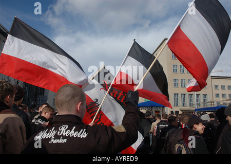 German far right demonstrators wave flags at rally Dresden Stock Photo