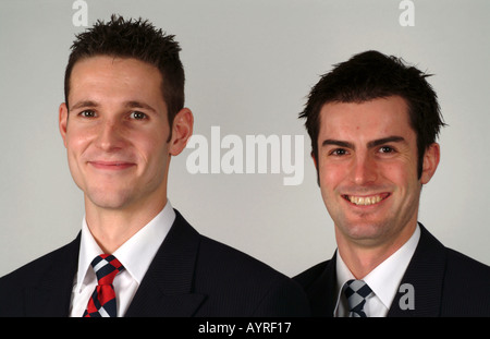 Portrait of two male air stewards, London UK Stock Photo