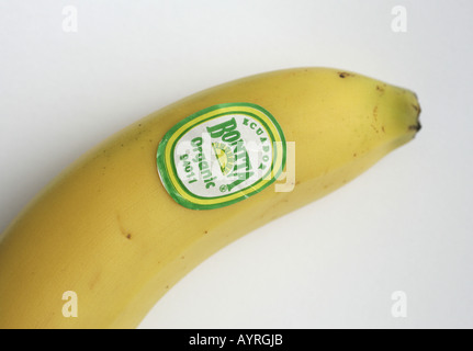 one organic banana with label Stock Photo