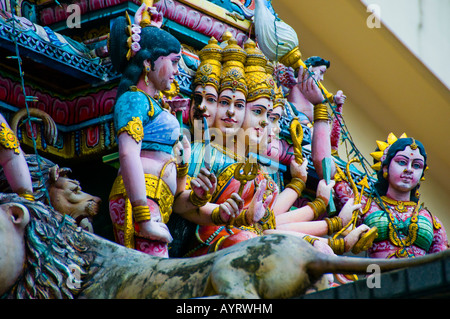 Close up of colorful figures and faces on a Hindu temple in Little India area of Singapore Sri Veeramakaliamman Temple Stock Photo