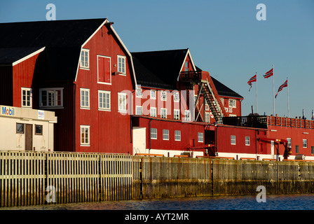 Red Rorbuer wooden fishing houses, Henningsvaer, Lofoten, Norway Stock Photo