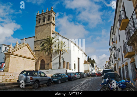 Small street and church in Granada, Andalusia, Spain Stock Photo