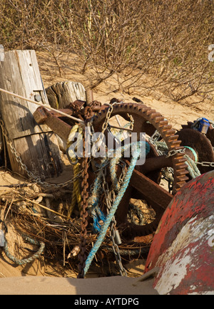 Ropes chains wheels cogs on sand in Somerset,UK Stock Photo