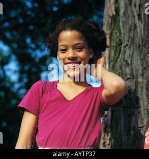 young smiling girl, youth, portrait, half-breed, mulatto Stock Photo