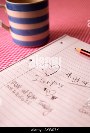 I Love You Doodle on a lined pad, with pencil and retro mug Stock Photo