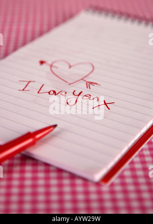 I Love You heart scribble on pad with pen Stock Photo