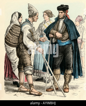 People from Valencia left and Granada Spain in their regional attire. Hand-colored print Stock Photo