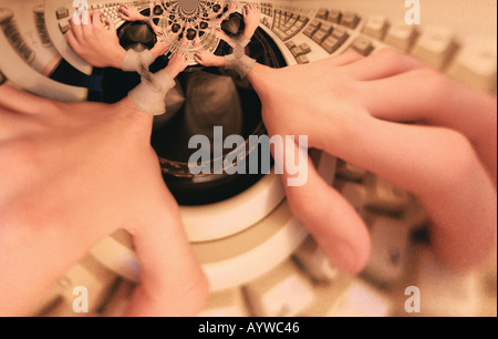 hands on keyboard Stock Photo