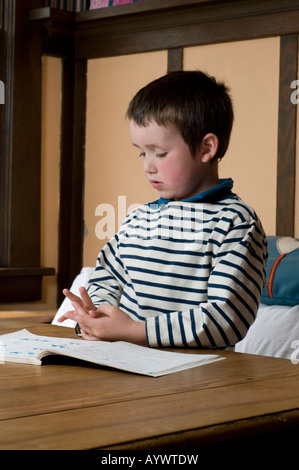 boy doing home work Stock Photo