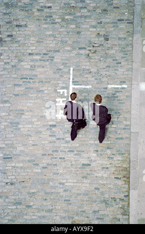 Overhead View of Two Men Walking Down a Street Stock Photo