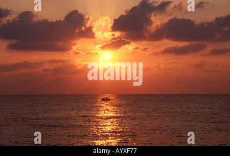 Sunset with boat Corniche Beirut Lebanon Stock Photo