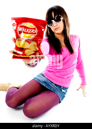 Teenage Girl Eating Crisps Model Released Stock Photo