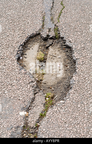 A pot ^hole in the road, UK. Stock Photo