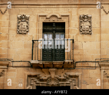 Details of carved armorial shields and a window and wrought iron balcony on a mansion in Haro Haro La Rioja Spain Stock Photo