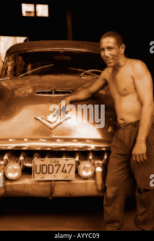 repairing-a-vintage-american-car-in-a-sidestreet-of-cienfuegos-cuba