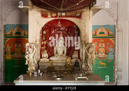 Jain temple interior altair with statues of Mahavira or Mahavir Varanasi Uttar Pradesh India Stock Photo