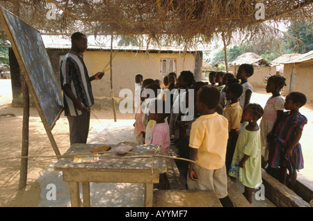 Children and teacher in a typical open air village primary school near Accra Stock Photo