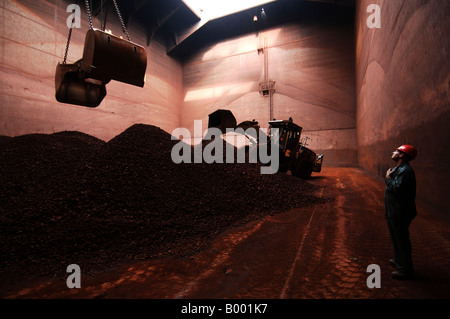 The EMO dry bulk terminal on Maasvlakte, raw materials such as iron ore and cole are transported, loaded stored and distributed Stock Photo