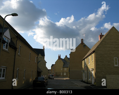Street on new build estate, Witney, Oxfordshire, England, UK Stock Photo
