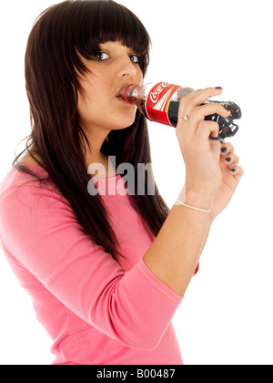 Teenager Drinking Bottle of Coke Model Released Stock Photo