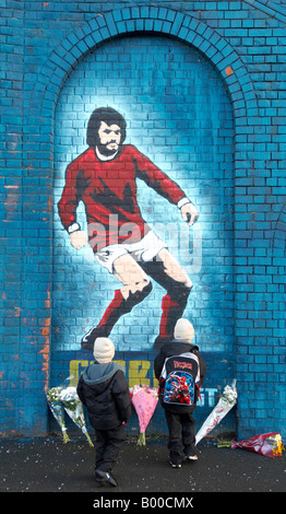 Wall mural celebrating Football legend George Best at Windsor Park football ground Stock Photo