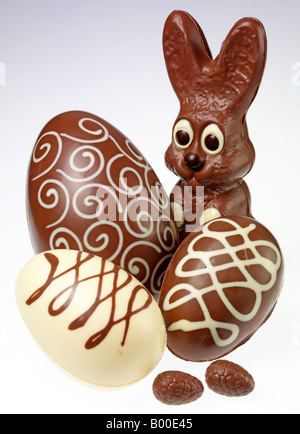 CHOCOLATE RABBIT WITH EASTER EGGS Stock Photo