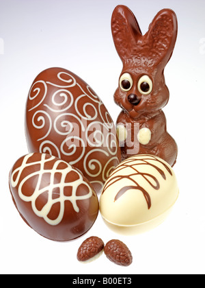 CHOCOLATE RABBIT WITH EASTER EGGS Stock Photo