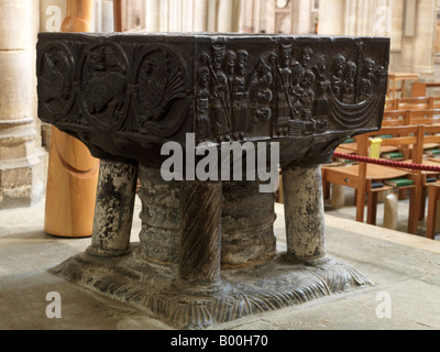 Winchester Cathedral 12th Century Tournei  Font with Carving of St Nicholas Stock Photo