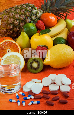 Vitamins and fresh fruits Stock Photo