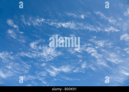 White narrow clouds on blue sky , Finland Stock Photo