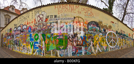 A 2 picture panoramic stitch of the Lennon Wall of graffiti in Prague. Stock Photo