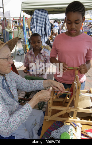 Florida Osceola County,Orlando,Kissimmee,Toho Square,Kowtown Festival,festivals,celebration,fair,annual cowboy heritage celebration,loom,adult adults Stock Photo