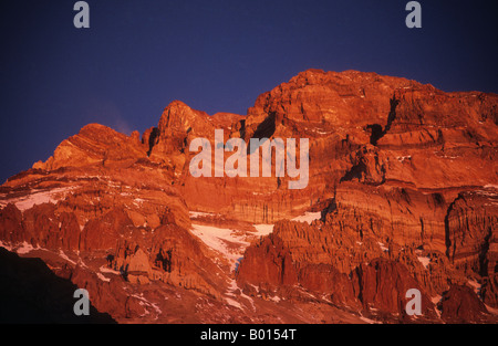 Sunset on west face of Mt Aconcagua, seen from Plaza de Mulas base camp, Argentina Stock Photo