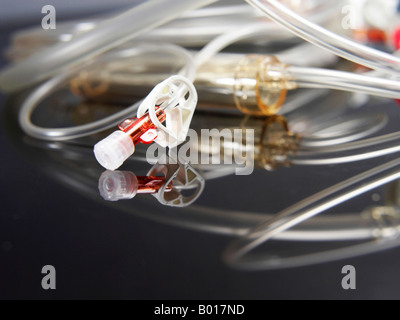 Intravenous tubes with valve Stock Photo