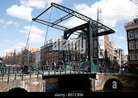 canal lift bridge over kloveniersburgwal canal within the university district amsterdam netherlands north holland europe Stock Photo