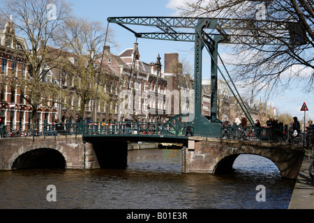 canal lift bridge over kloveniersburgwal canal within the university district amsterdam netherlands north holland europe Stock Photo