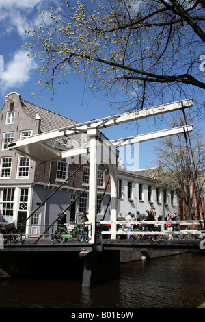 canal lift bridge over groenburgwal canal within the university district amsterdam netherlands north holland europe Stock Photo