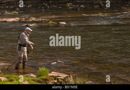 Angling author journalist and broadcaster Charles Rangeley Wilson fly fishing for wild brown trout on the River Usk at Gliffaes Stock Photo