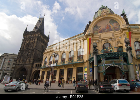 Horizontal wide angle of the front Art Nouveau facade of the Municipal House 'Obecní dům' and the Powder Tower in the sunshine. Stock Photo