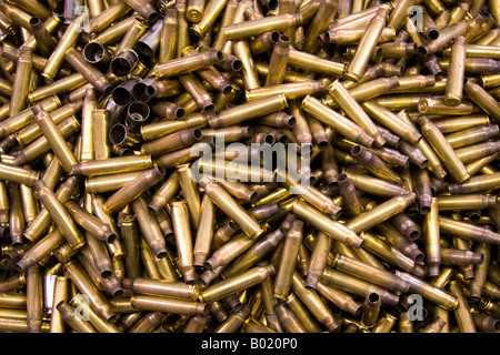 Pile of spent rifle shell casings Stock Photo